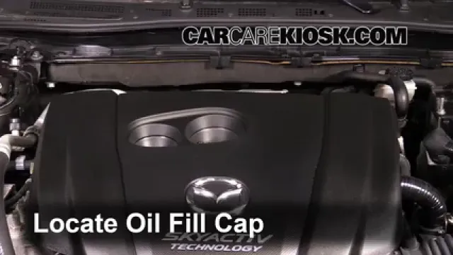2014 Mazda 3 Touring 2.0L 4 Cyl. Sedan Aceite Agregar aceite